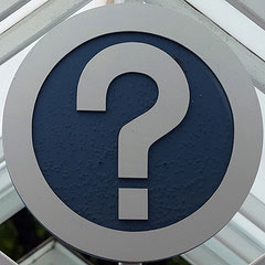 question mark on white circle sign