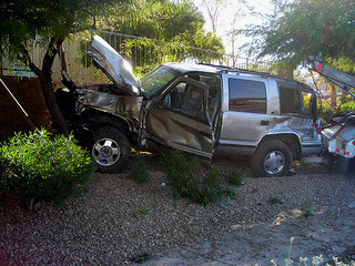 car crashed into a tree