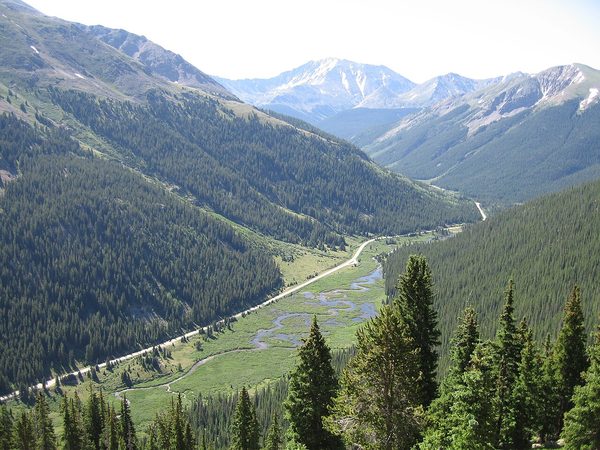 Highway 82 through a Rocky Mountain valley, Colorado
