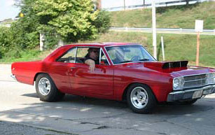 wisconsin red car driving from autorama show