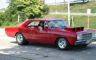 wisconsin red car driving from autorama show